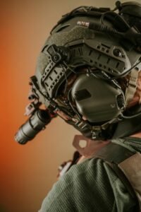 Close-up of a tactical helmet with night vision gear, showcasing modern military technology.